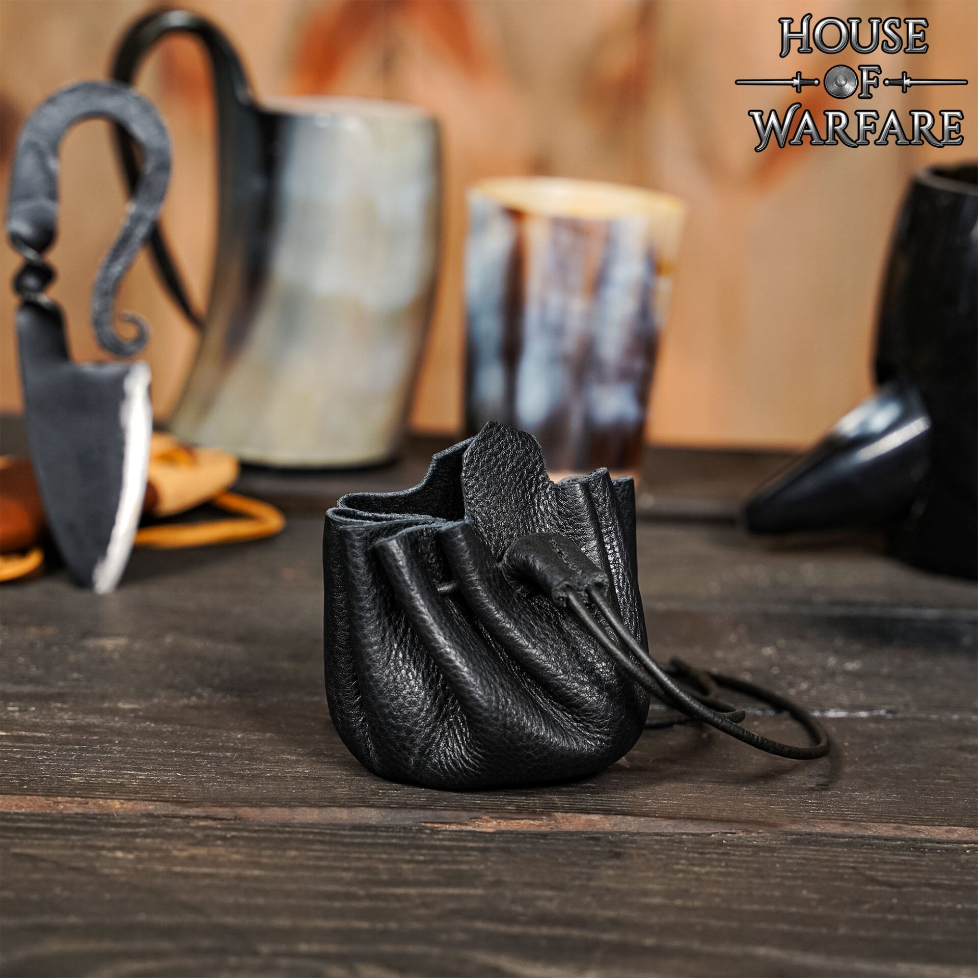 Imagen única de: Monedero Pequeño de Cuero - Bolsita Artesanal Negra con Cordón para Monedas, Dados, Joyas