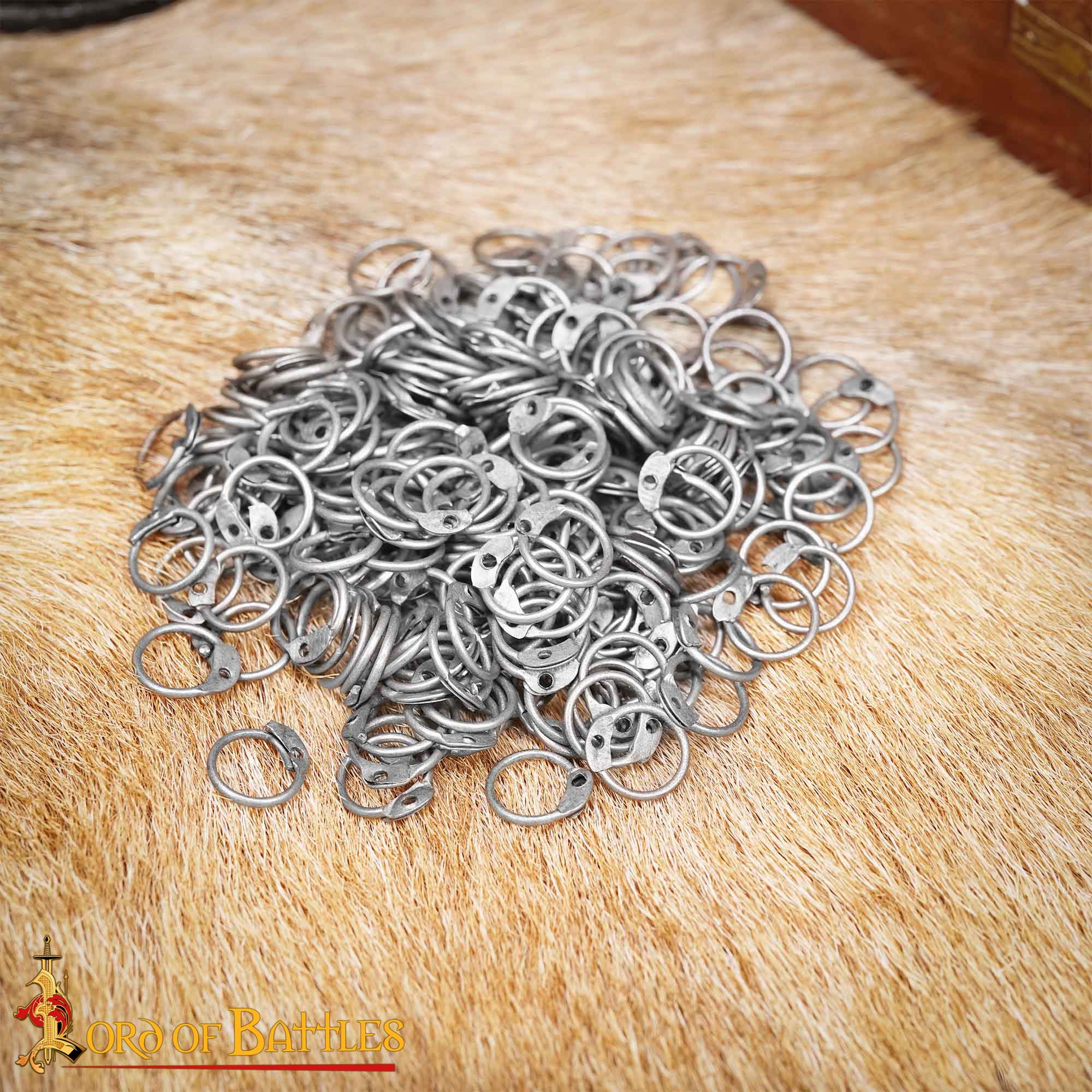 Anillas de acero 9 mm (calibre 18) — 1 kg, con remaches