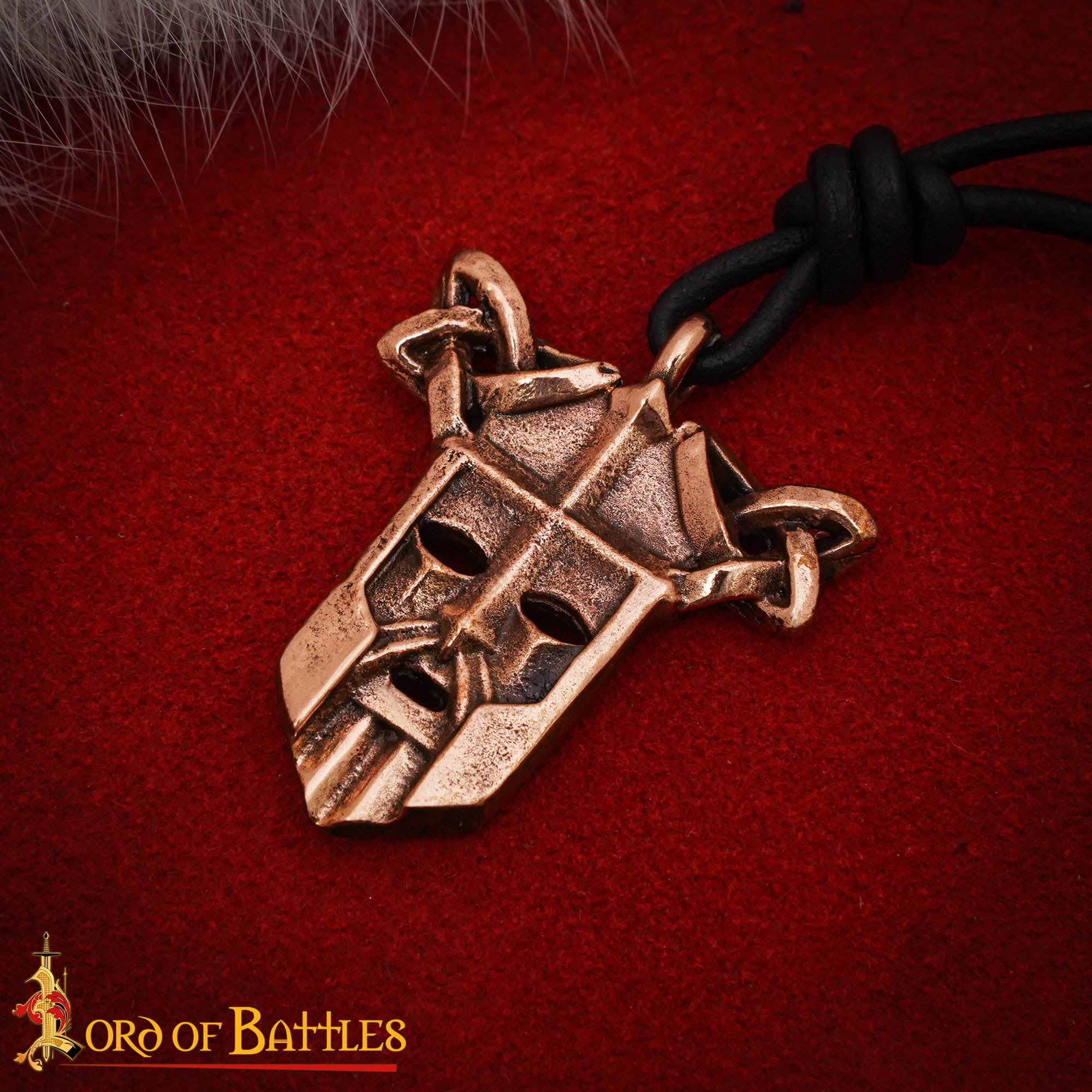 Imagen única de: Colgante Máscara Vikinga - 2,9 X 3 Cm, Acabado en Bronce Antiguo con Detalle de Nudos