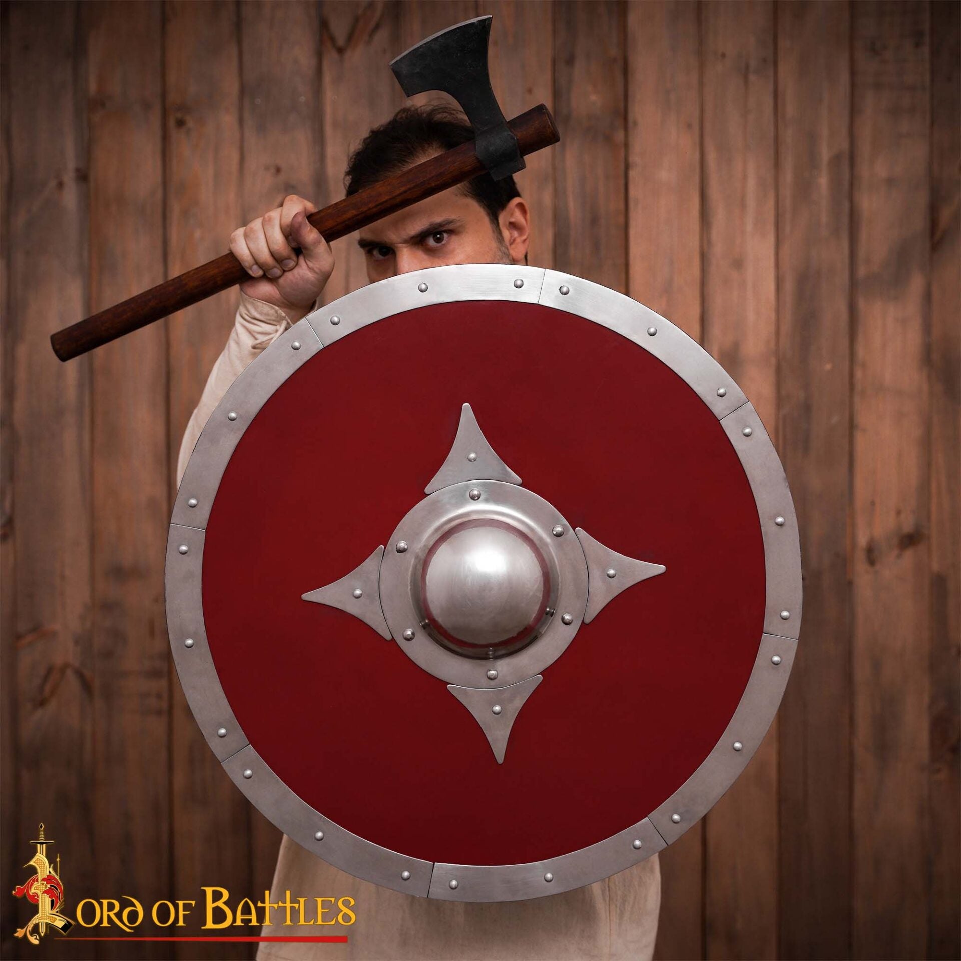 Imagen única de: Escudo vikingo rojo de madera con herrajes de acero y umbo